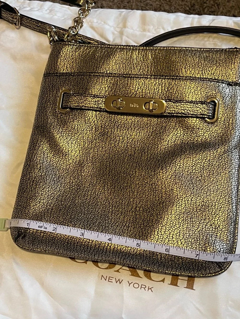 Coach Swagger Swingpack Metallic Gold Crossbody Bag with Turnlock Detail and bag